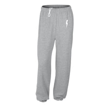 Load image into Gallery viewer, Graphic pants with a small white lightning bolt on grey sweatpants