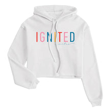 Load image into Gallery viewer, Graphic crop hoodie sweatshirt with the word ignited in rainbow colors, sweatshirt is white
